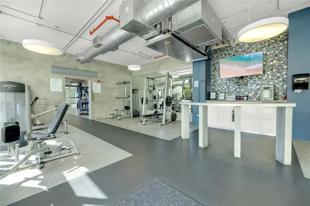 a view of a room with gym equipment