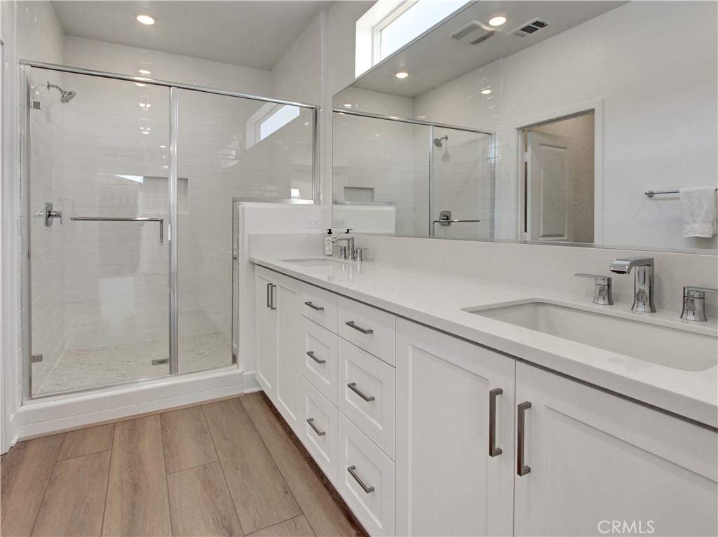 230 Sora Irvine, CA 92618 - Photo 20 of 52 a bathroom with a shower sink and mirror