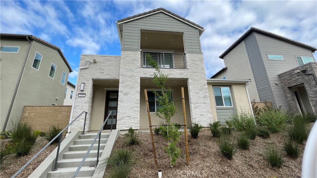 230 Sora Irvine, CA 92618 - Photo 38 of 52 a front view of a house with a yard