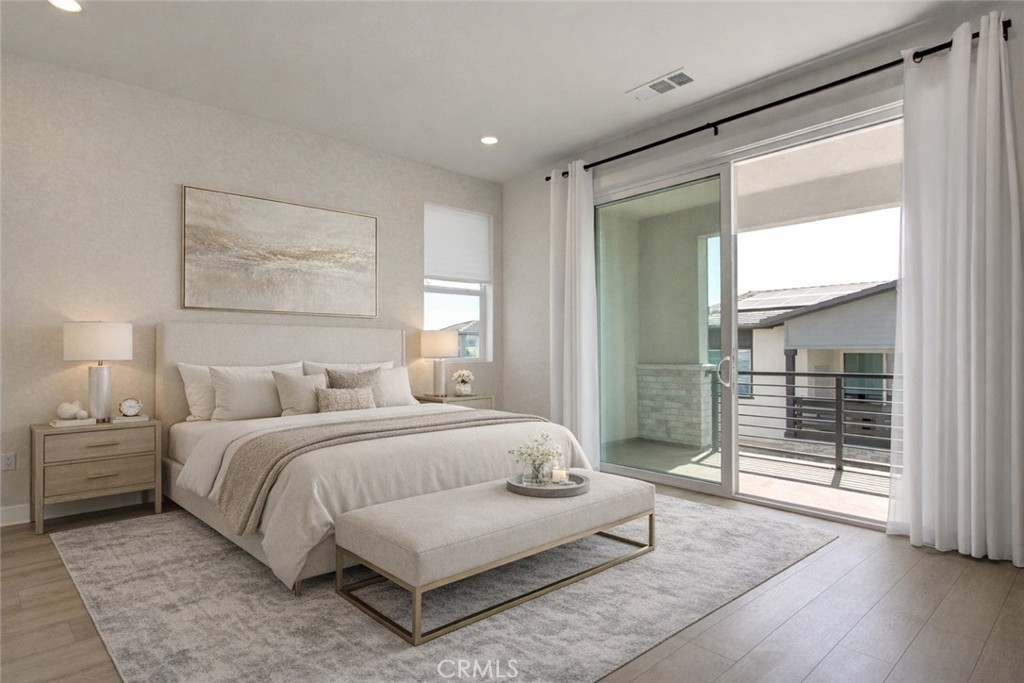 230 Sora Irvine, CA 92618 - Photo 8 of 52 a spacious bedroom with a bed and a walk in closet