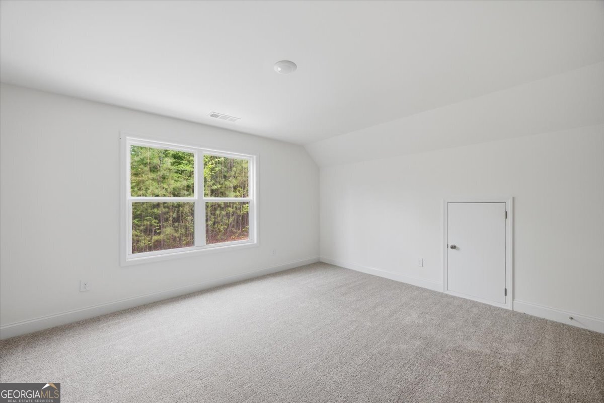 2778 Boxankle Road Forsyth, GA 31029 - Photo 16 of 21 an empty room with a window