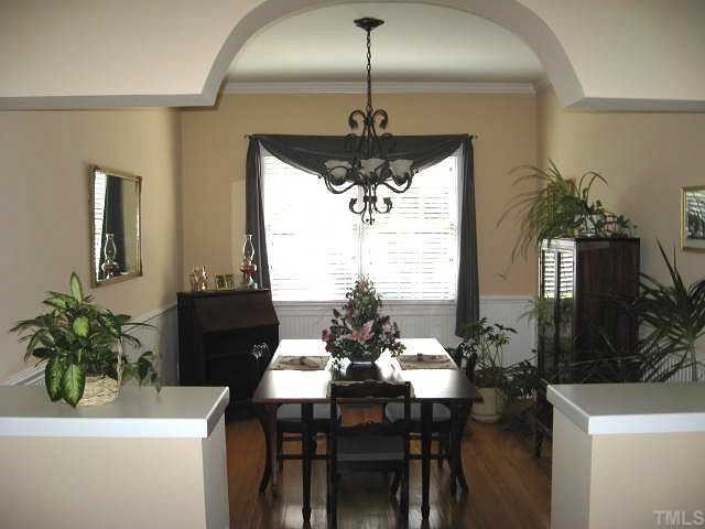 1502 Duplin Road Raleigh, NC 27607 - Photo 3 of 12 Formal dining room with arched entrance, chair rail, & beadboard wainscot Dining Room