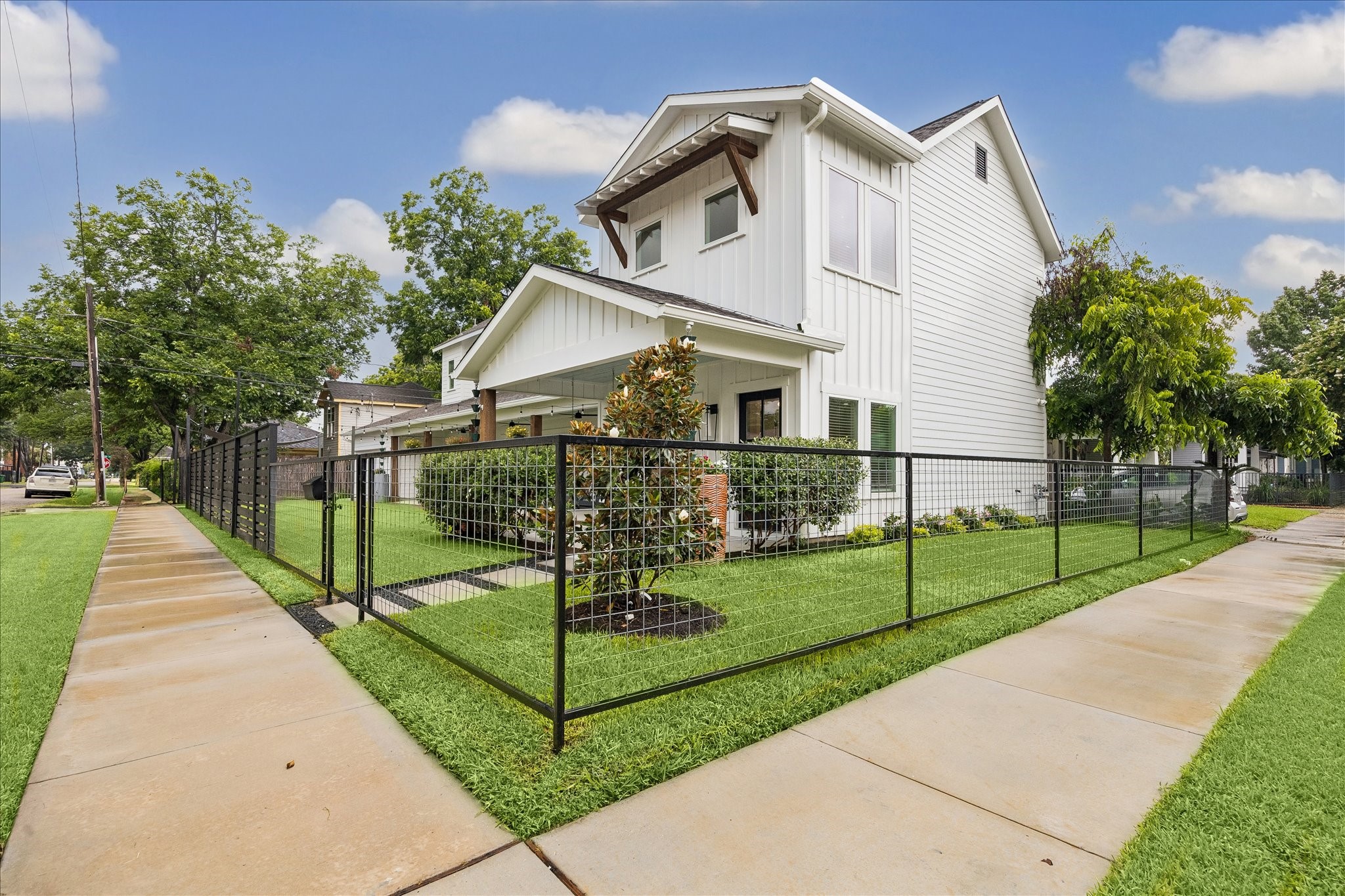 1205 Temple Street Houston, TX 77009 - Photo 1 of 33 Positioned on a coveted corner lot, the home enjoys abundant natural light, enhanced privacy, and an architectural presence that distinguishes it from surrounding properties.
