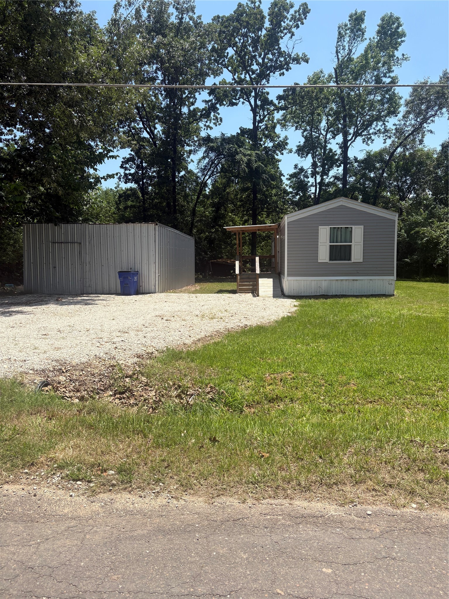 1311 Big Hawg Road Trinity, TX 75862 - Photo 1 of 4 2 Bedrooms, 2 Baths and Shop on 2 Lots.