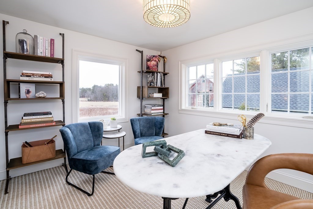 1051 Chesterfield Road Northampton, MA 01062 - Photo 14 of 42 a living room with furniture and a large window