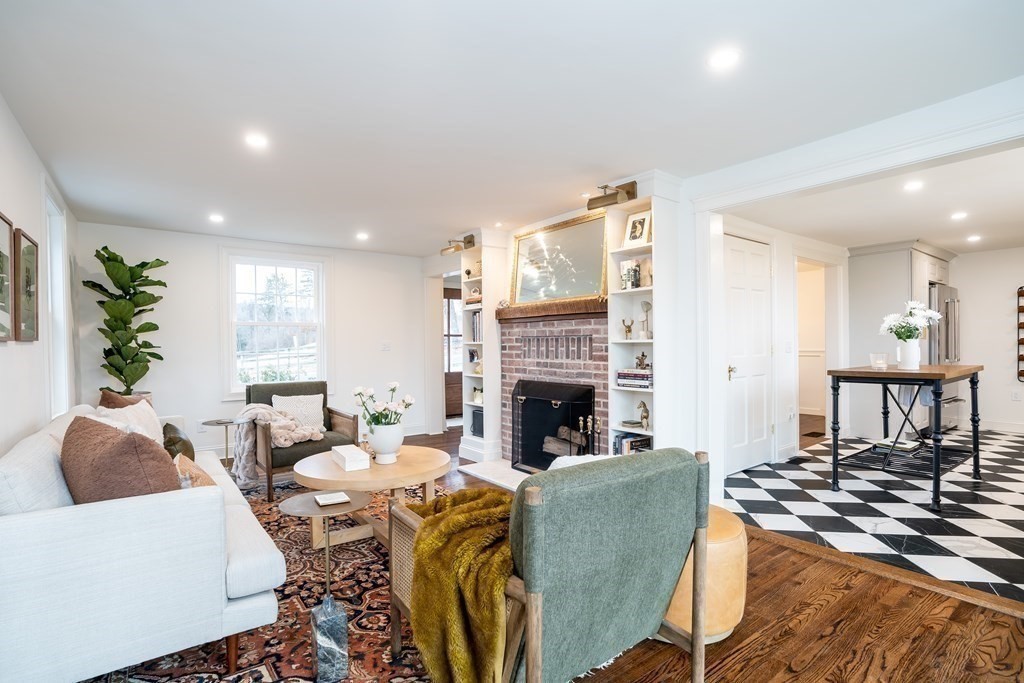 1051 Chesterfield Road Northampton, MA 01062 - Photo 15 of 42 a living room with furniture and a fireplace