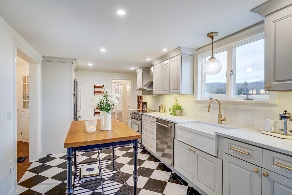 1051 Chesterfield Road Northampton, MA 01062 - Photo 16 of 42 a kitchen with a sink appliances and cabinets