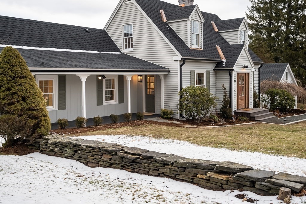 1051 Chesterfield Road Northampton, MA 01062 - Photo 2 of 42 a front view of a house with a yard
