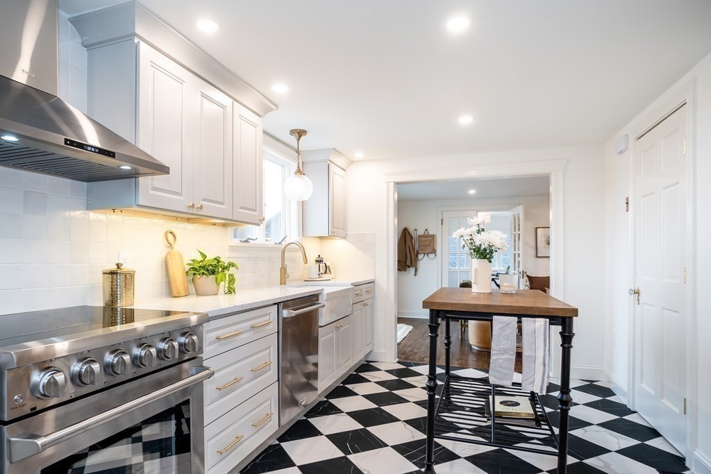 1051 Chesterfield Road Northampton, MA 01062 - Photo 21 of 42 a kitchen with a dining table and chairs