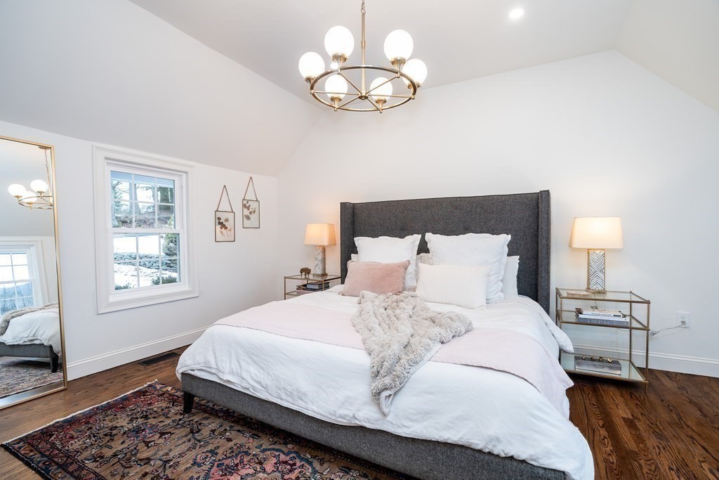 1051 Chesterfield Road Northampton, MA 01062 - Photo 24 of 42 a bedroom with a bed and wooden floor