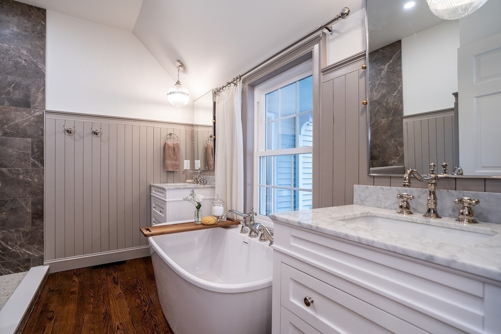 1051 Chesterfield Road Northampton, MA 01062 - Photo 27 of 42 a bathroom with a bathtub and sink