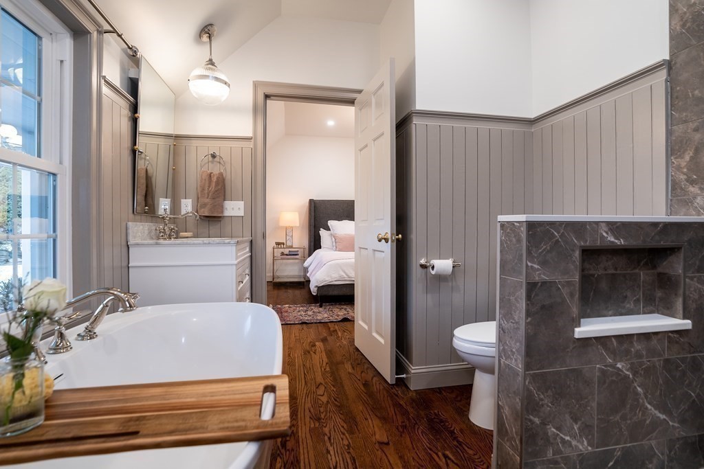 1051 Chesterfield Road Northampton, MA 01062 - Photo 28 of 42 a bathroom with a sink toilet and shower