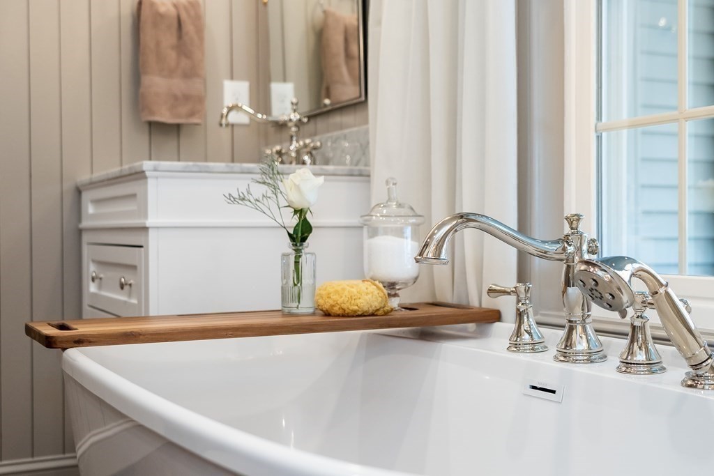 1051 Chesterfield Road Northampton, MA 01062 - Photo 29 of 42 a bathroom with a sink and a mirror