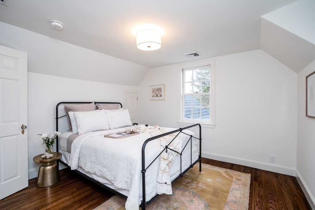 1051 Chesterfield Road Northampton, MA 01062 - Photo 33 of 42 a bedroom with a bed and wooden floor