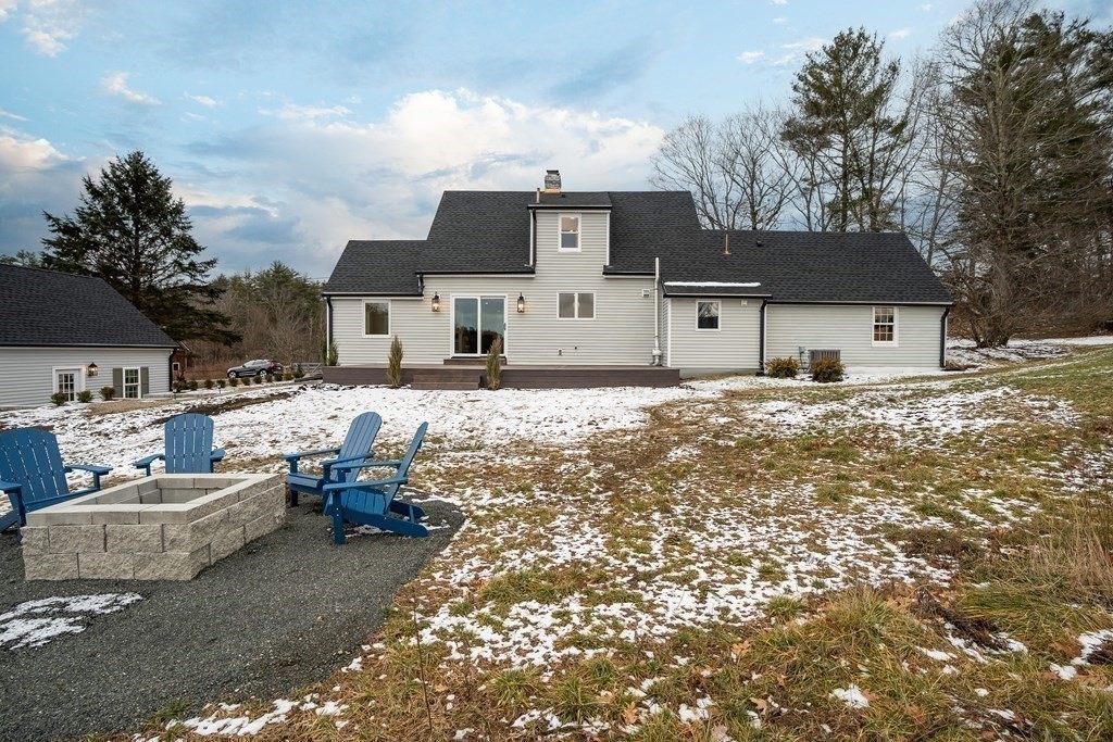 1051 Chesterfield Road Northampton, MA 01062 - Photo 37 of 42 a front view of a house with cars parked