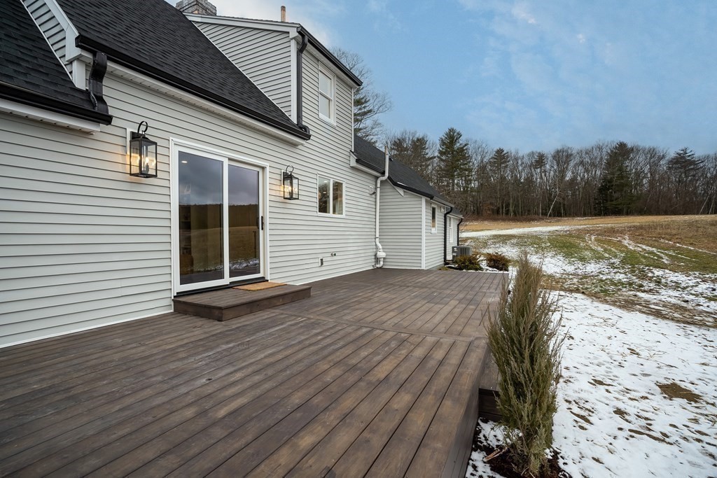 1051 Chesterfield Road Northampton, MA 01062 - Photo 39 of 42 a view of a house with a yard