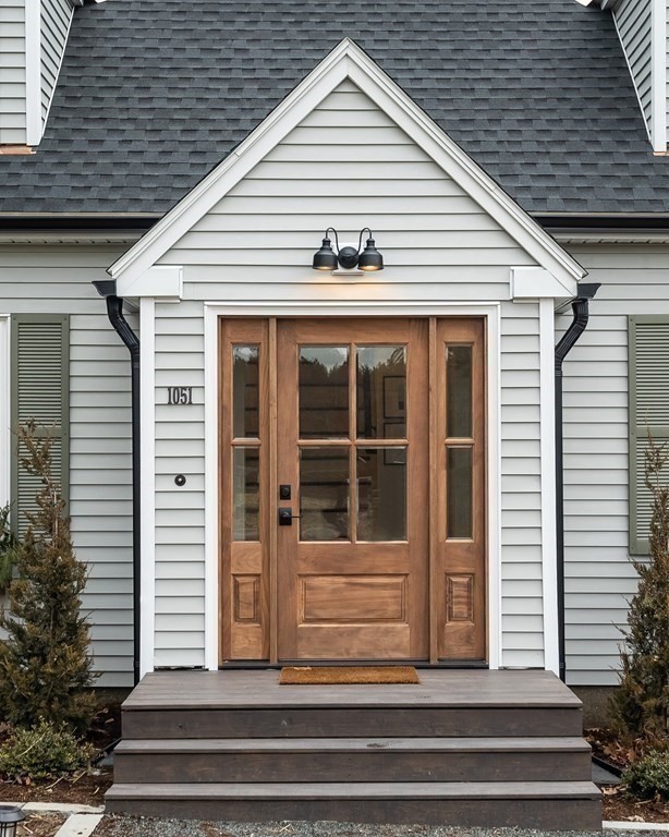 1051 Chesterfield Road Northampton, MA 01062 - Photo 4 of 42 a front view of a house with a balcony