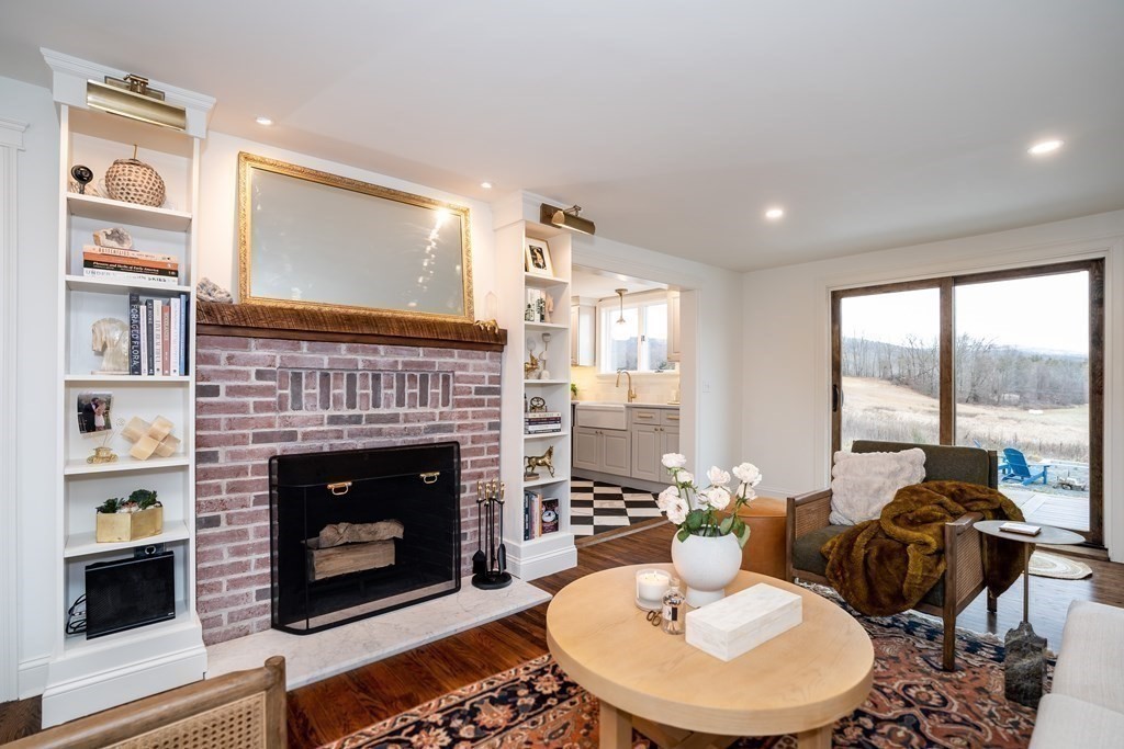 1051 Chesterfield Road Northampton, MA 01062 - Photo 9 of 42 a living room with furniture fireplace and window