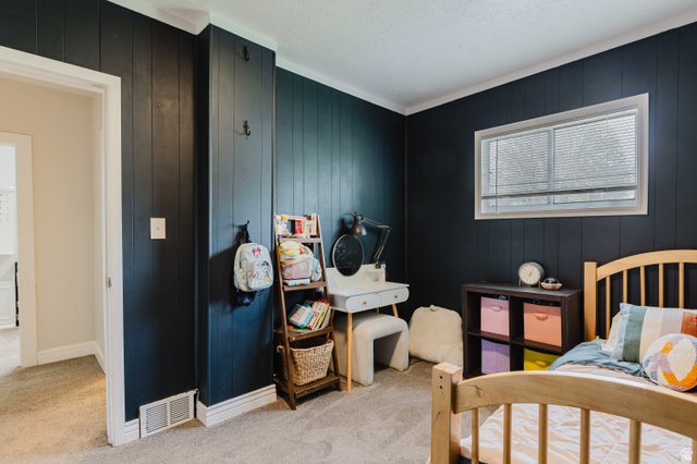 244 North 600 West Logan, UT 84321 - Photo 10 of 30 Room featuring dark paneled walls with white trim and a window with blinds