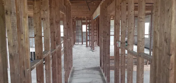 a view of a bathroom from a hallway
