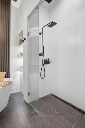 a bathroom with a toilet and a sink