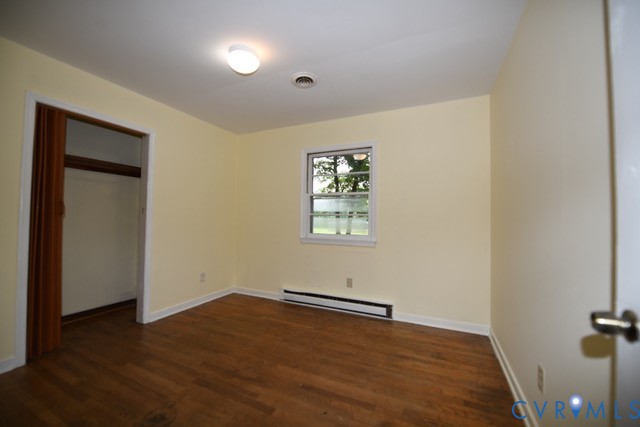 12720 Bailey Bridge Road Midlothian, VA 23112 - Photo 7 of 10 Room featuring wood-finish flooring, a single wind