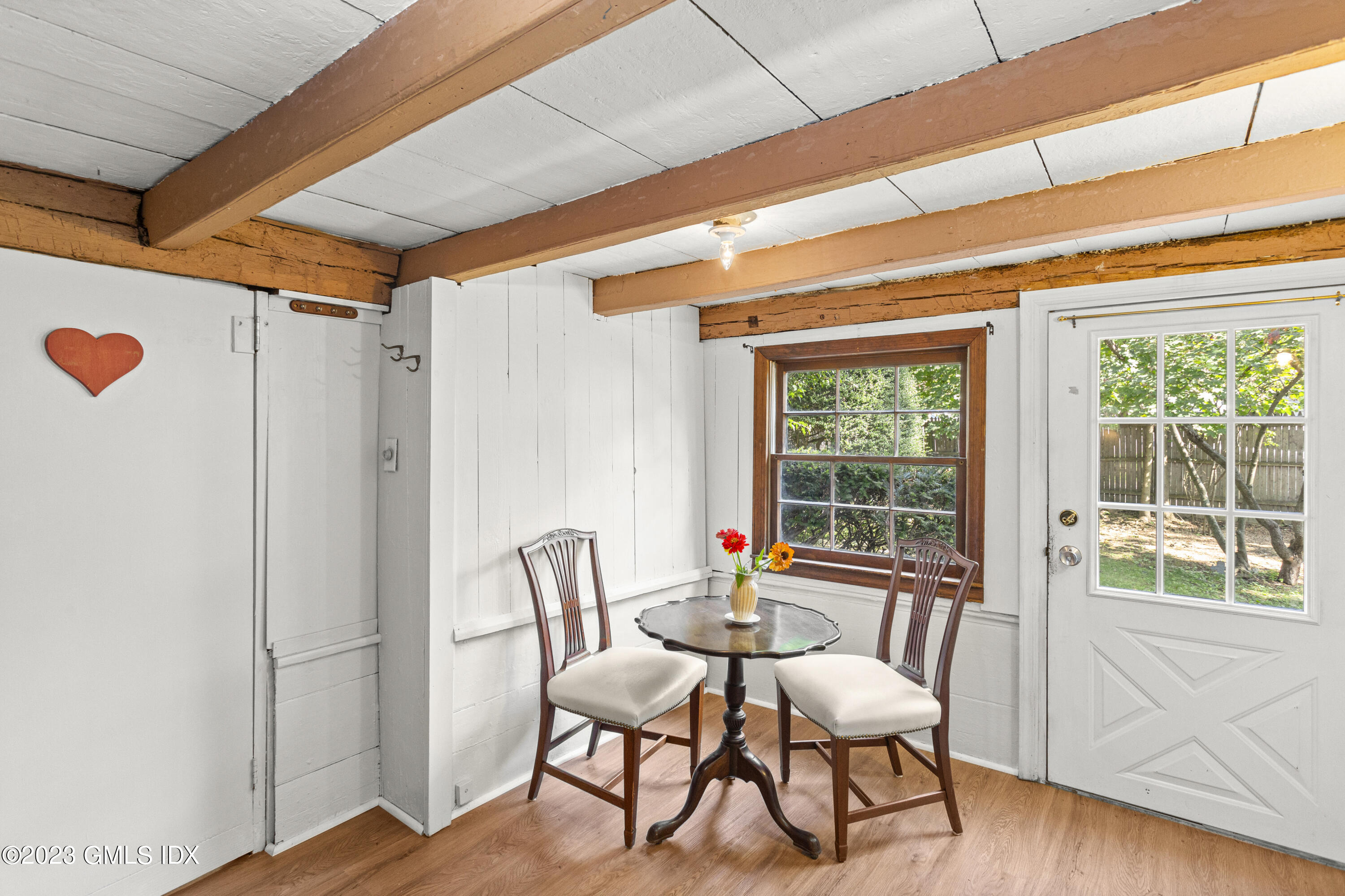 1 Cary Road Riverside, CT 06878 - Photo 9 of 15 a dining room with furniture and wooden floor