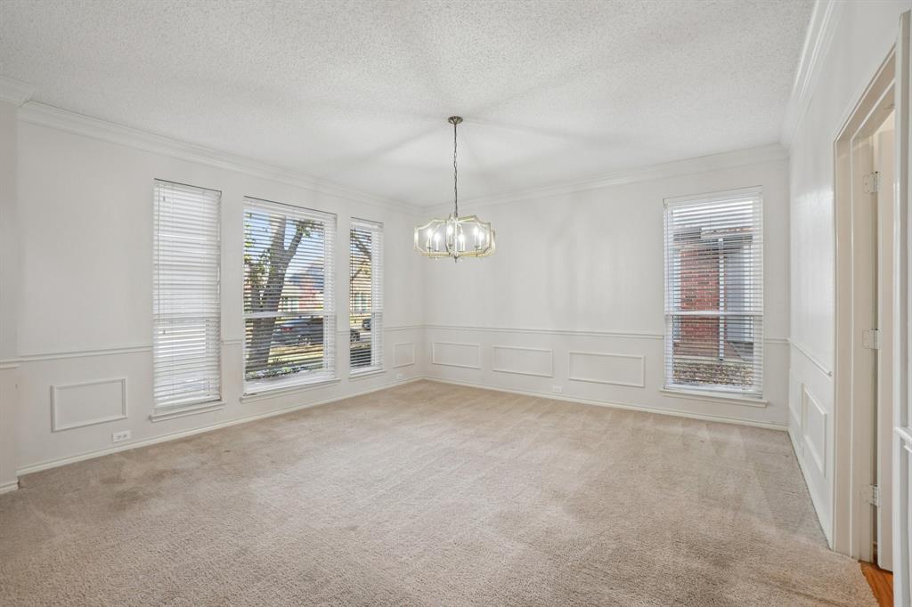 3110 Andrew Lane Carrollton, TX 75007 - Photo 13 of 36 an empty room with windows and entrance