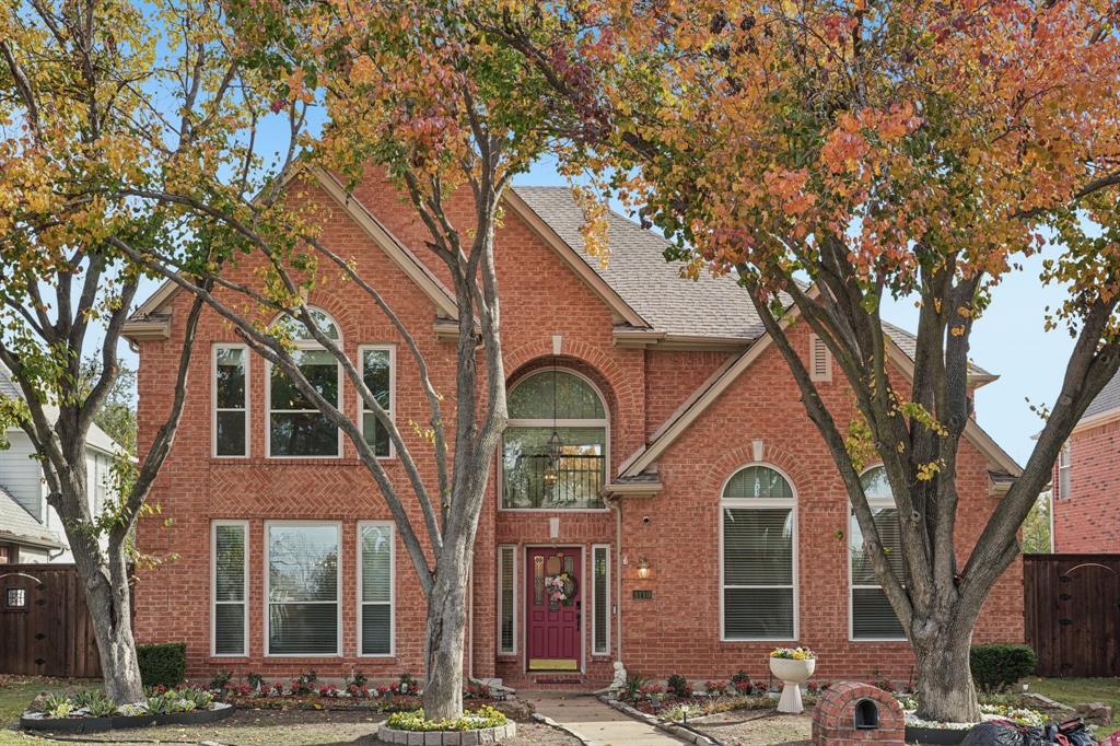 3110 Andrew Lane Carrollton, TX 75007 - Photo 2 of 36 a front view of a house with a trees