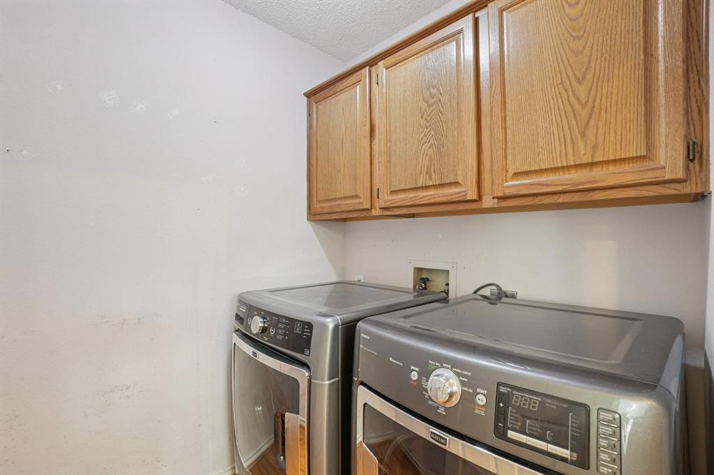 3110 Andrew Lane Carrollton, TX 75007 - Photo 30 of 36 a stove top oven sitting inside of a kitchen