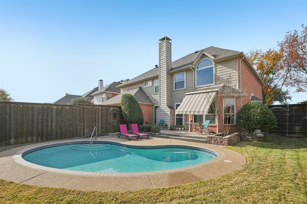 3110 Andrew Lane Carrollton, TX 75007 - Photo 32 of 36 a swimming pool with outdoor seating and yard