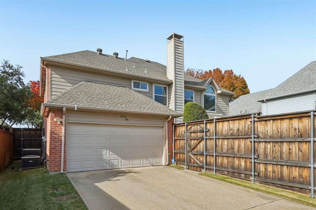 3110 Andrew Lane Carrollton, TX 75007 - Photo 34 of 36 a front view of a house with a garden