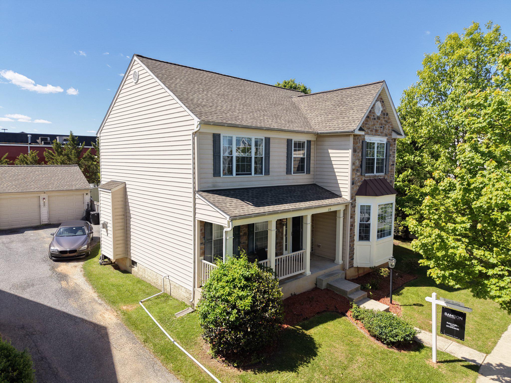 215 Seamaster Road Essex, MD 21221 - Photo 2 of 40 a aerial view of a house with yard and potted plants