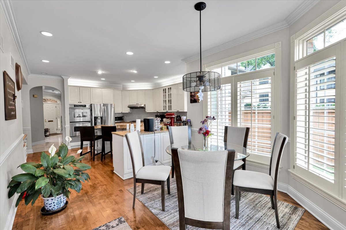 310 North County Line Road Hinsdale, IL 60521 - Photo 13 of 43 a view of a dining room with furniture window and outside view