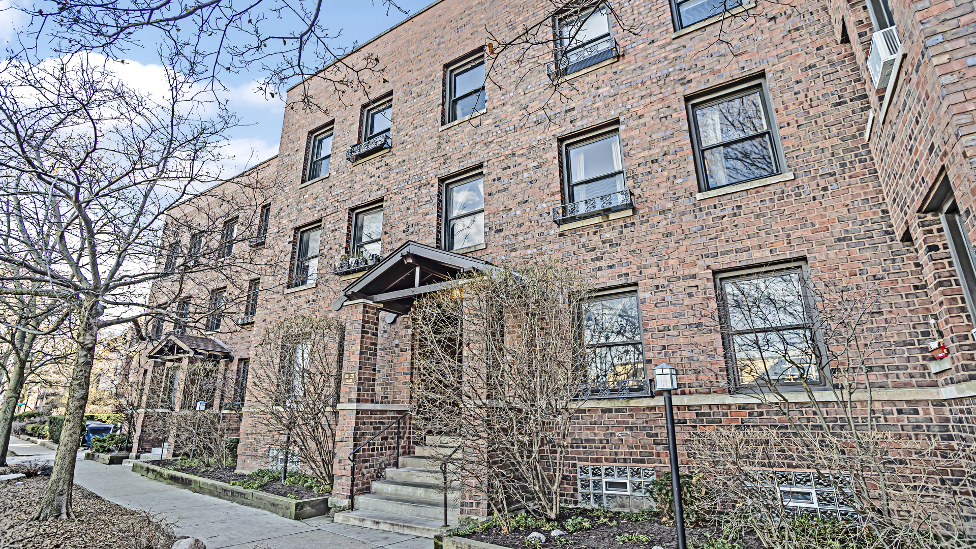 322 Main Street, Unit 2 Evanston, IL 60202 - Photo 1 of 15 front view of a brick building