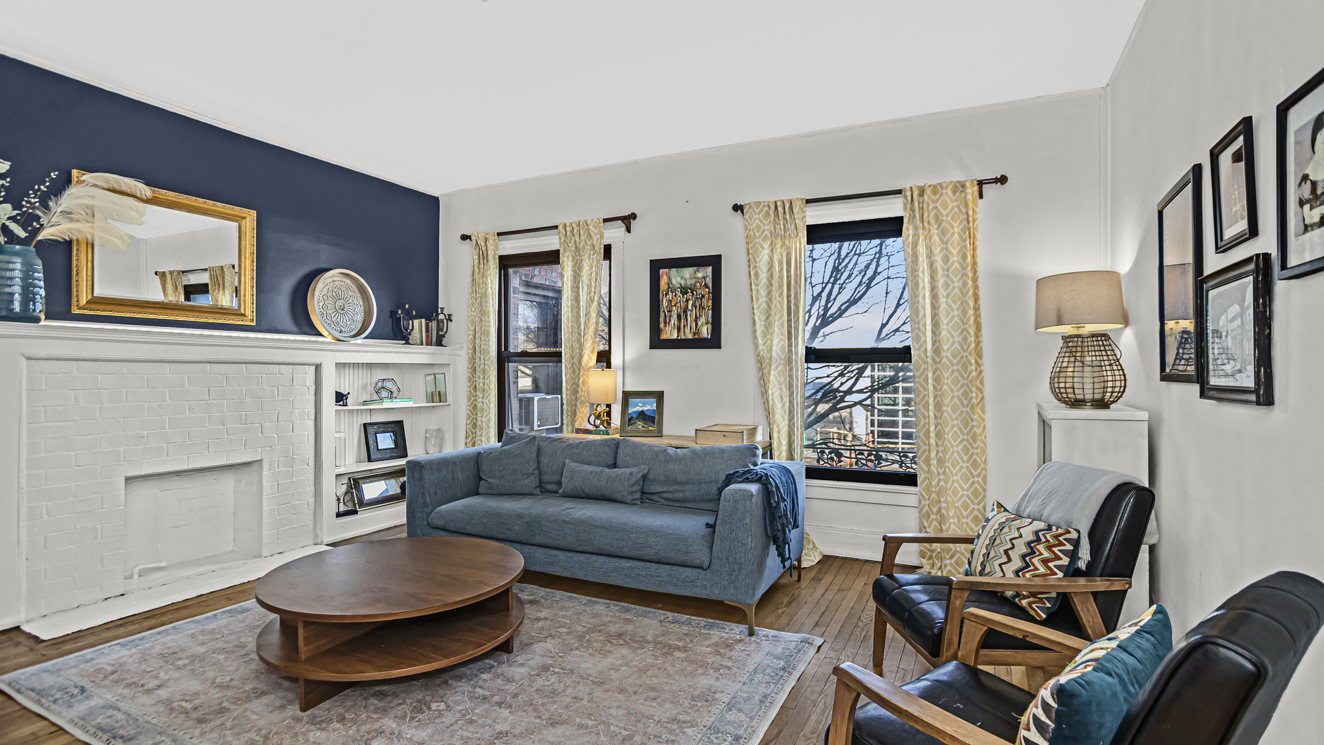 322 Main Street, Unit 2 Evanston, IL 60202 - Photo 2 of 15 a living room with furniture and a wooden floor