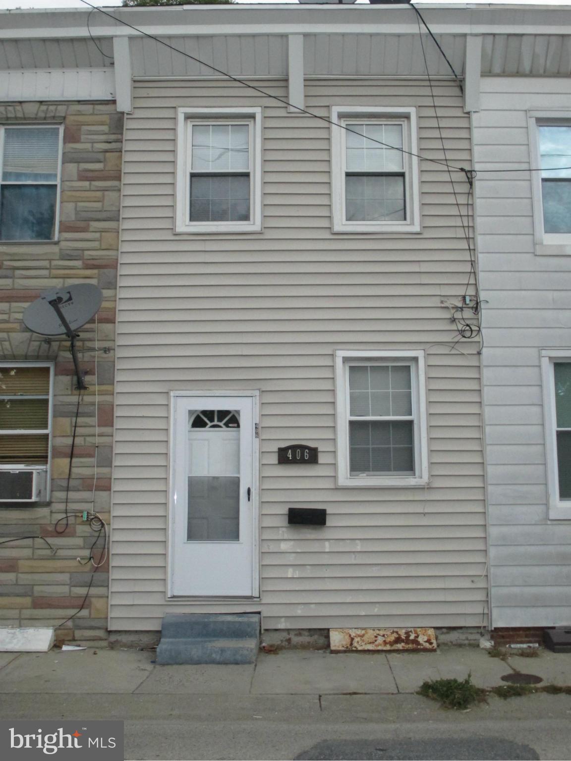 a view of a house with a white door