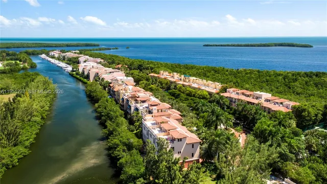 a view of a lake with a yard