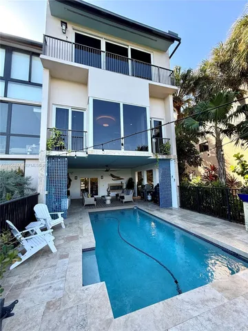 a house with a tree in front of it