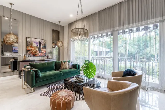 a spacious bathroom with a granite countertop sink and a mirror