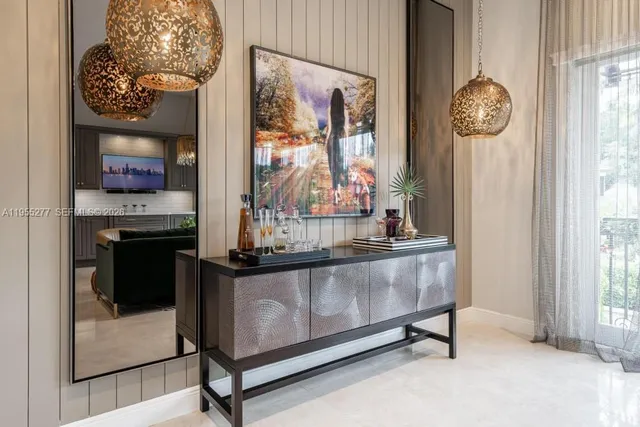 a picture of a living room with a fireplace