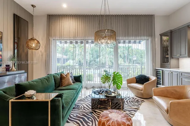 a view of a room that has a table and chairs