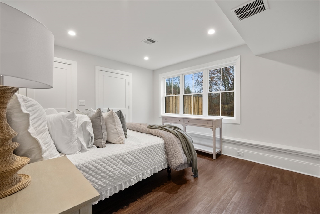 16 Wayside Road, Unit 14 Natick, MA 01760 - Photo 35 of 42 a bedroom with bed and a window