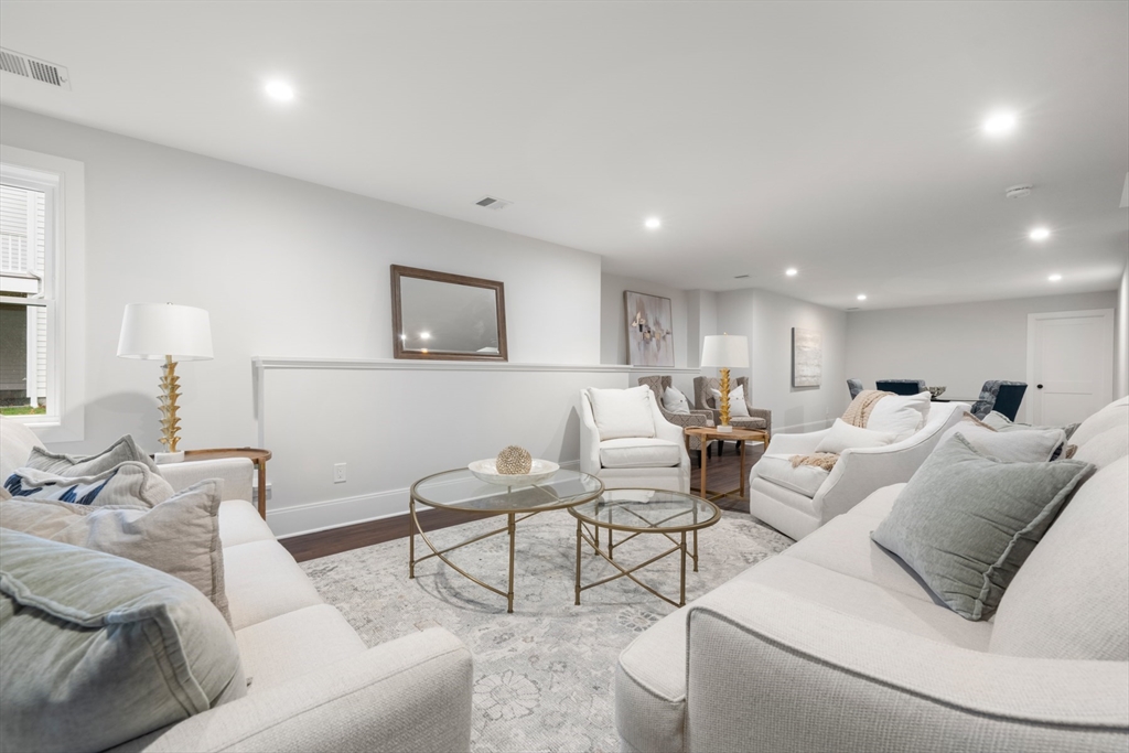 16 Wayside Road, Unit 14 Natick, MA 01760 - Photo 39 of 42 a living room with furniture and a large window