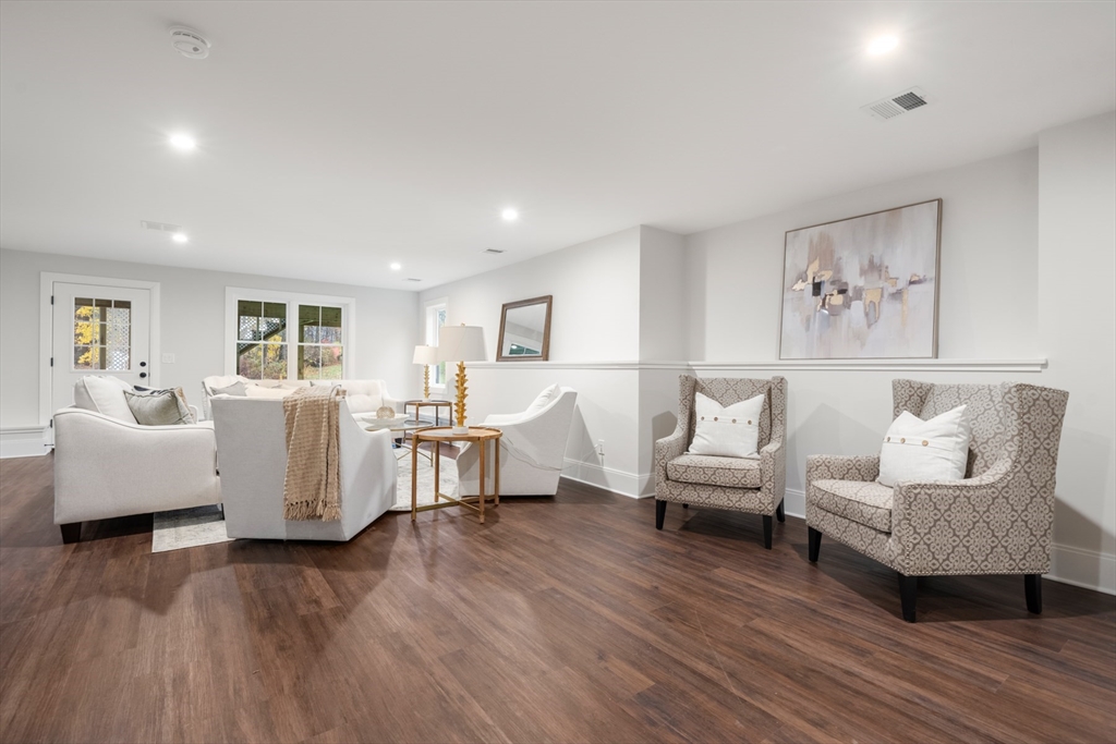 16 Wayside Road, Unit 14 Natick, MA 01760 - Photo 41 of 42 a living room with furniture and wooden floor