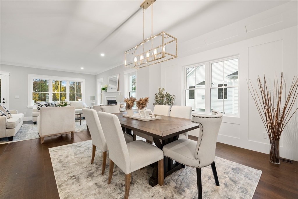 16 Wayside Road, Unit 14 Natick, MA 01760 - Photo 5 of 42 a view of a dining room with furniture window and wooden floor