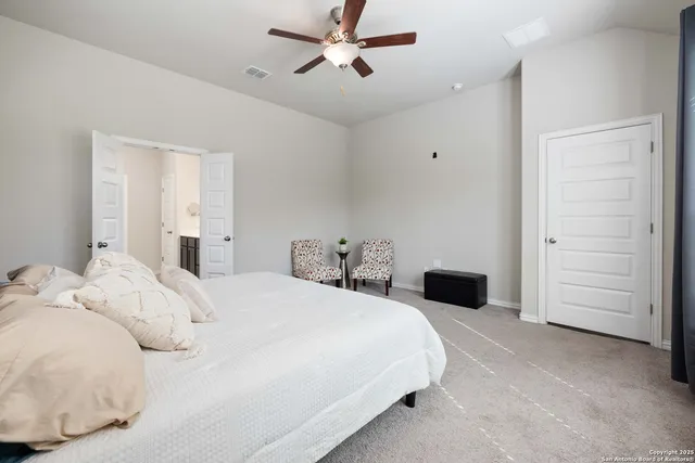 a bedroom with a bed and closet