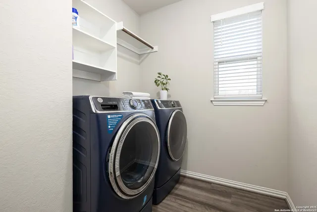 a utility room with dryer and washer