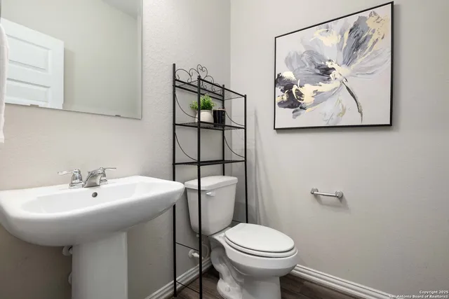 a bathroom with a sink and a toilet