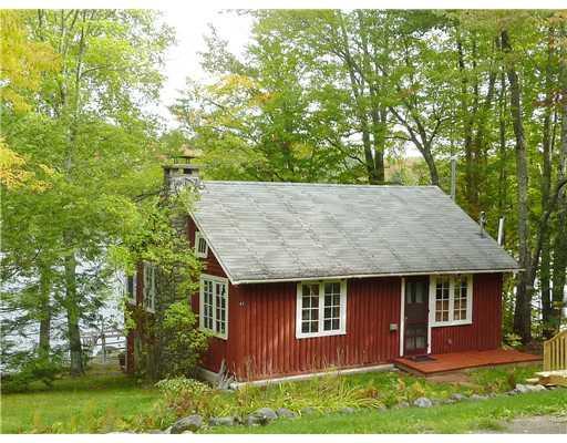 41 Widgeon Road Madison, ME 04950 - Photo 1 of 13 Exterior Front. Camp from the road view